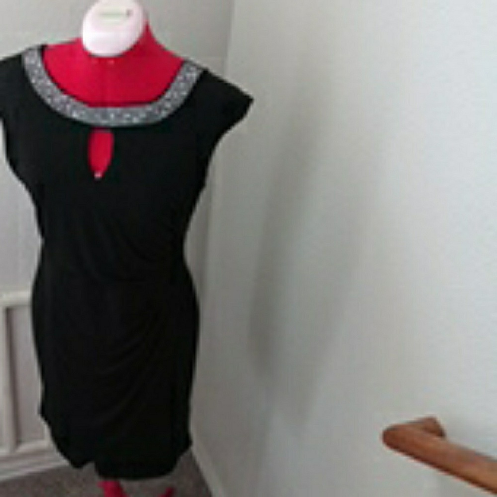 Karina. Black cocktail dress